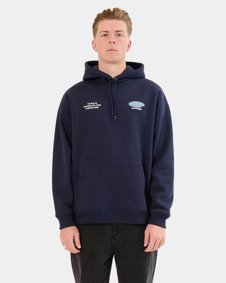Image of a model wearing Outerwear. Productname: Worship Mens Observer Pullover Hoodie Peacoat - in Peacoat colour by brand - Worship