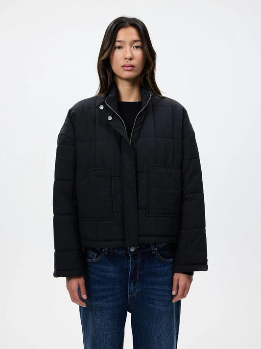 Image of a model wearing Outerwear. Productname: MSE Quilted Jacket in Black colour by brand - MSE