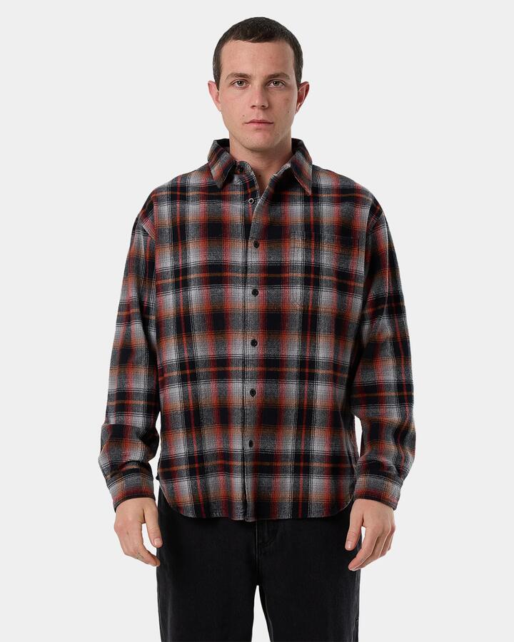 Image of a model wearing Tops. Productname: Thrills - Mens Barrio Flannel Long Sleeve Shirt - Black - in Black colour by brand - Thrills