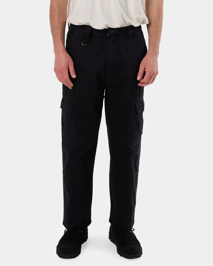 Image of a model wearing Pants. Productname: Thrills - Mens Big Slacker Union Utility Cargo Pants - Caviar - in Caviar colour by brand - Thrills
