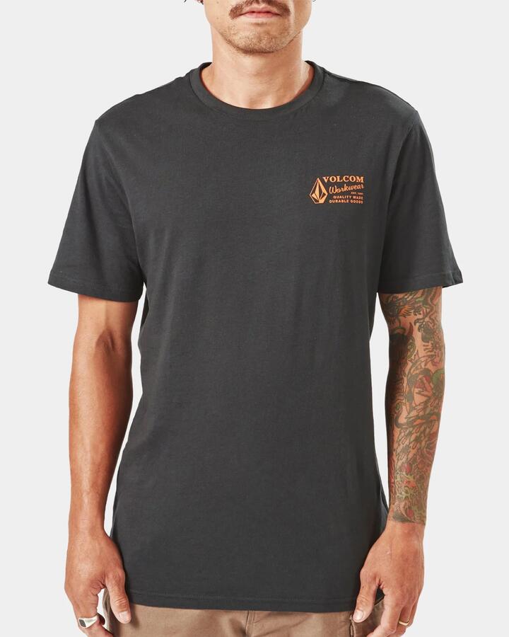 Image of a model wearing Uniforms & Workwear. Product name - Volcom Mens Workwear T-Shirt Black in Black colour by brand - Volcom