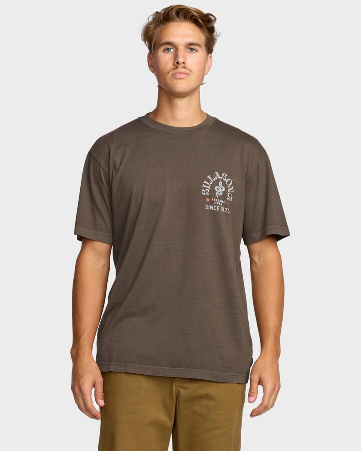 Image of a model wearing Tops. Productname: Billabong Mens Coiled T-Shirt Dark Brown - in Dark Brown colour by brand - Billabong