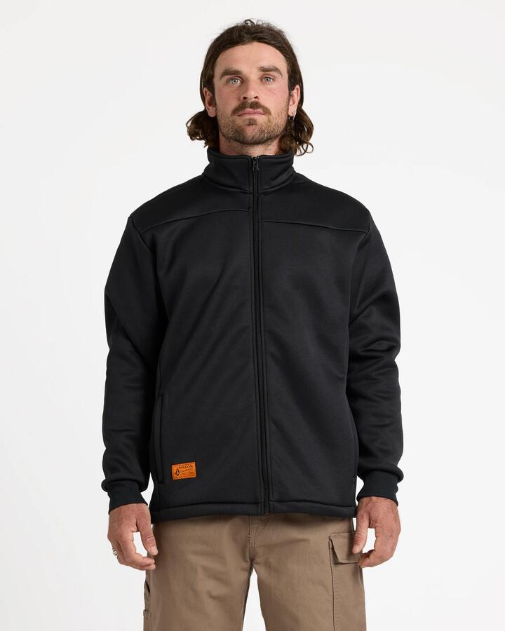 Image of a model wearing Uniforms & Workwear. Productname: Volcom - Mens Workwear Bonded Fleece Jacket - Black - in Black colour by brand - Volcom