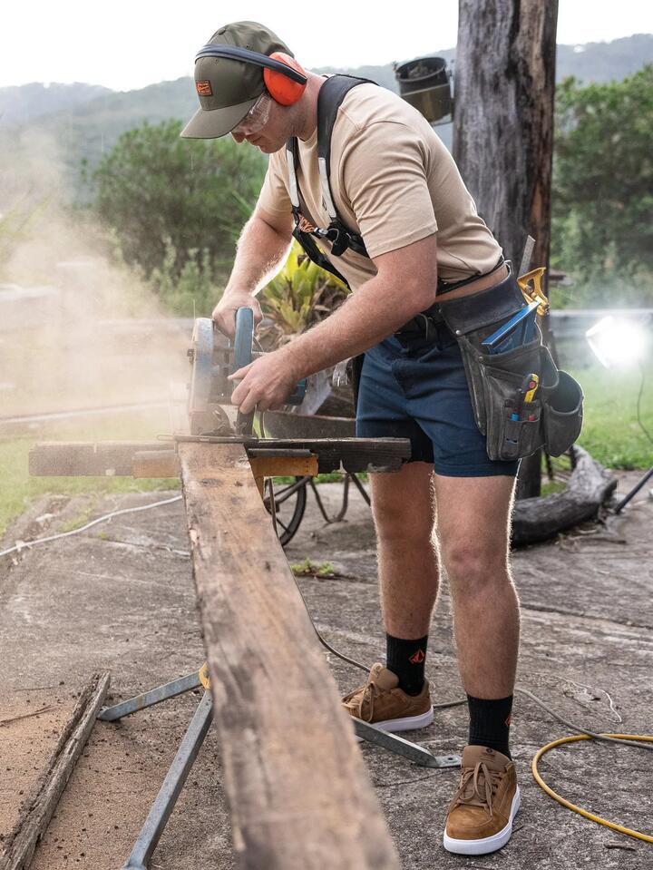 Image of a model wearing Uniforms & Workwear. Productname: Volcom - Mens Workwear Bevel 15" Work Shorts - Navy - in Navy colour by brand - Volcom