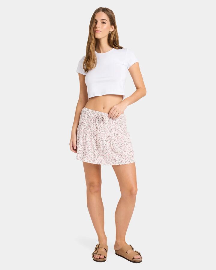 Image of a model wearing Skirts. Product name - Nunui Womens Springdield Tiered Mini Skirt Dusty Pink in Dusty Pink colour by brand - Nunui