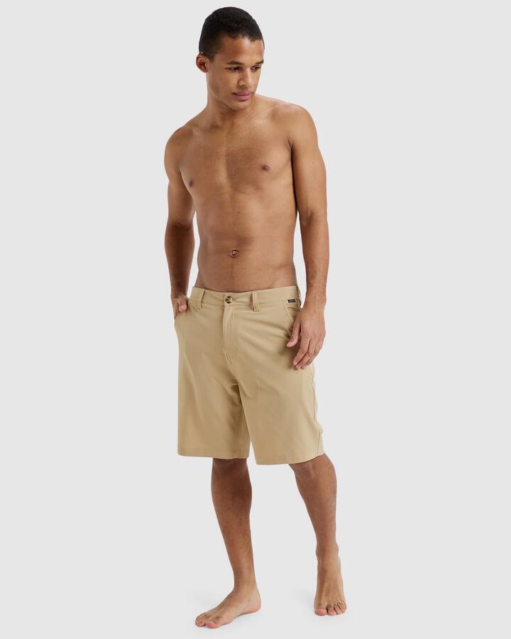 Image of a model wearing Shorts. Product name - Quiksilver Mens Union Amphibian 20" Hybrid Shorts Khaki in Khaki colour by brand - Quiksilver