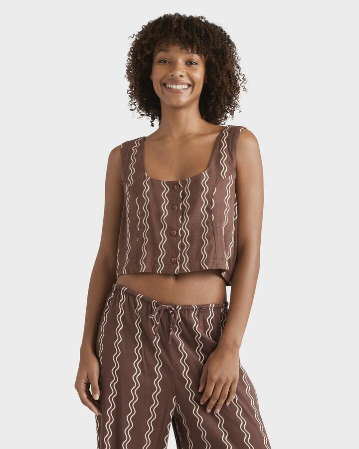 Image of a model wearing Tops. Product name - Billabong Womens Another Wave Woven Tank Top Espresso in Espresso colour by brand - Billabong