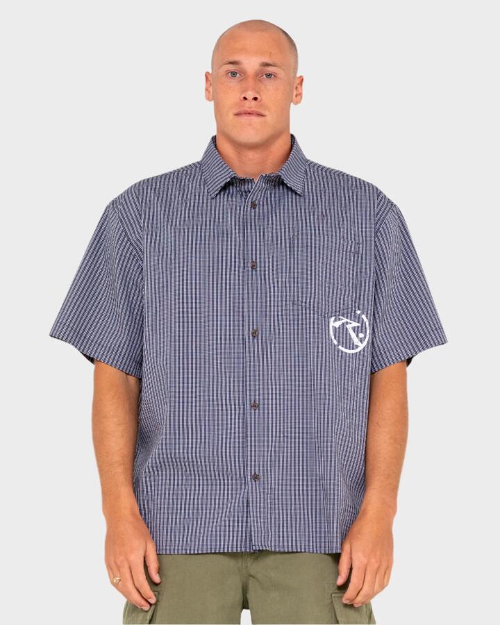 Image of a model wearing Tops. Productname: Rusty Mens Resno Recon Short Sleeve Shirt Navy Blue - in Navy Blue colour by brand - Rusty