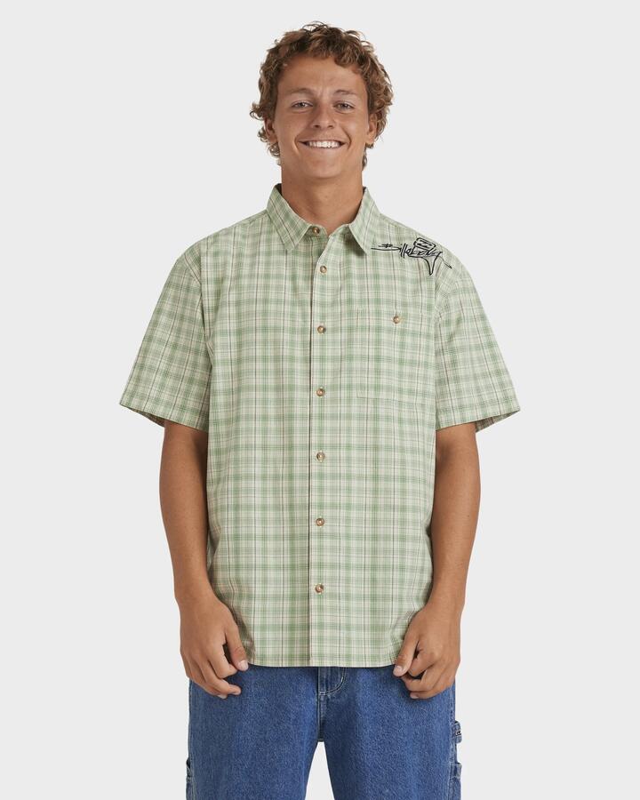 Image of a model wearing Tops. Product name - Billabong Mens Mogul Short Sleeve Shirt Oatmeal in Oatmeal colour by brand - Billabong