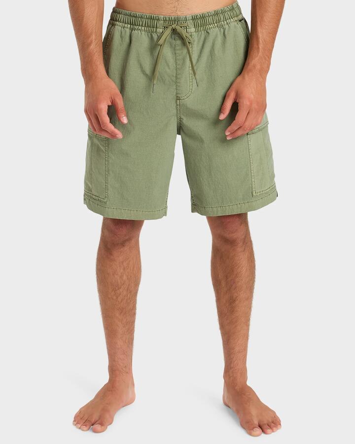 Image of a model wearing Shorts. Product name - Quiksilver Mens Taxer Surfwash 19" Hybrid Shorts Loden Green in Loden Green colour by brand - Quiksilver