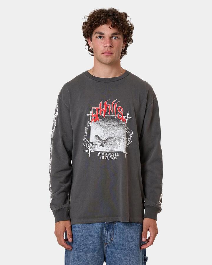 Image of a model wearing Tops. Product name - Thrills Mens Flight Risk Oversized Long Sleeve T-Shirt Black in Black colour by brand - Thrills