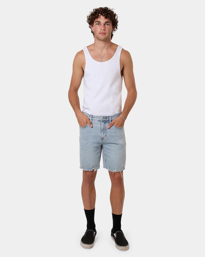 Image of a model wearing Shorts. Productname: Thrills Mens Bones Denim Shorts Blue - in Blue colour by brand - Thrills