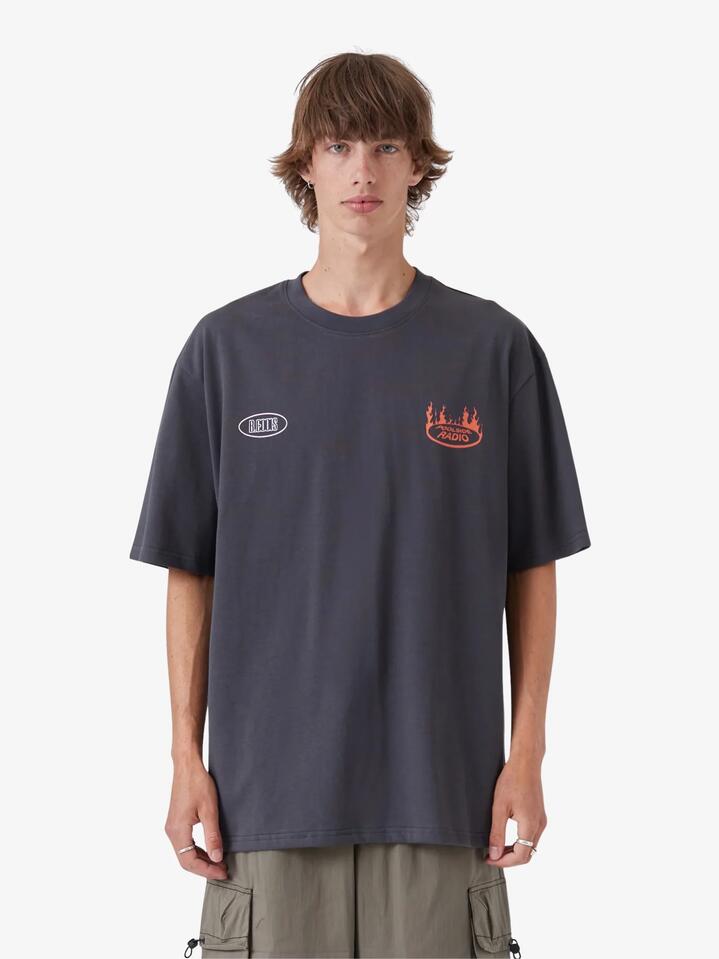 Image of a model wearing Tops. Productname: Barney Cools NWO Tee in Washed Black colour by brand - Barney Cools