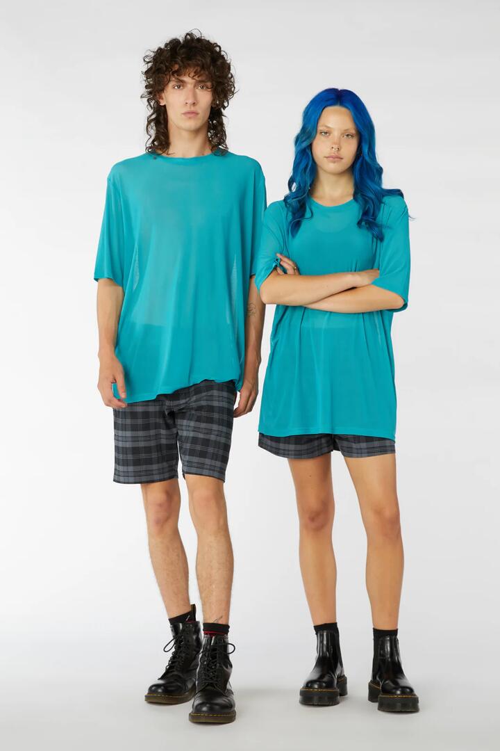 Image of a model wearing Tops. Productname: Sphinx Top in Teal colour by brand - Black Friday