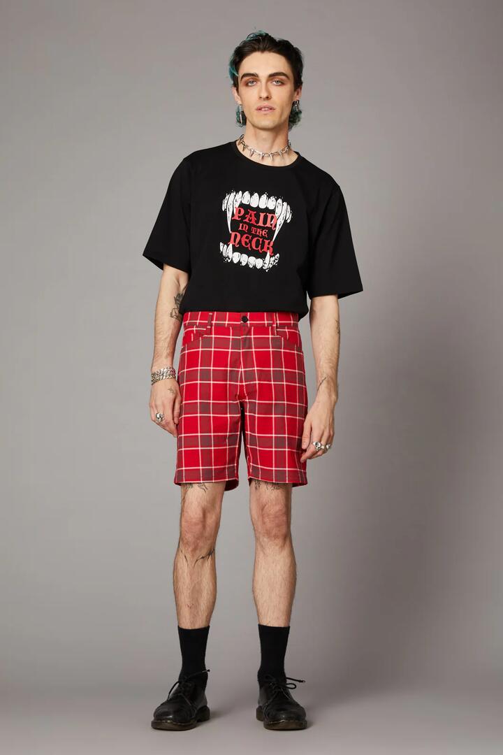 Image of a model wearing Shorts. Productname: Punk Red Tartan Unisex Short in Red colour by brand - Black Friday