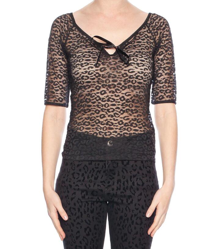 Image of a model wearing Tops. Productname: Carolina Lace Top in Black colour by brand - Revival
