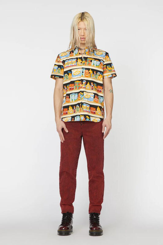 Image of a model wearing Tops. Productname: Supermarket Print Shirt in Multi colour by brand - Dangerfield