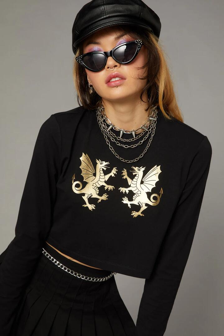 Image of a model wearing Tops. Productname: Gold Dragon Top in Black colour by brand - Black Friday