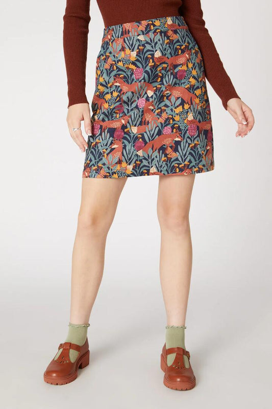 Image of a model wearing Skirts. Productname: Foxy Garden Skirt in Navy colour by brand - Princess Highway