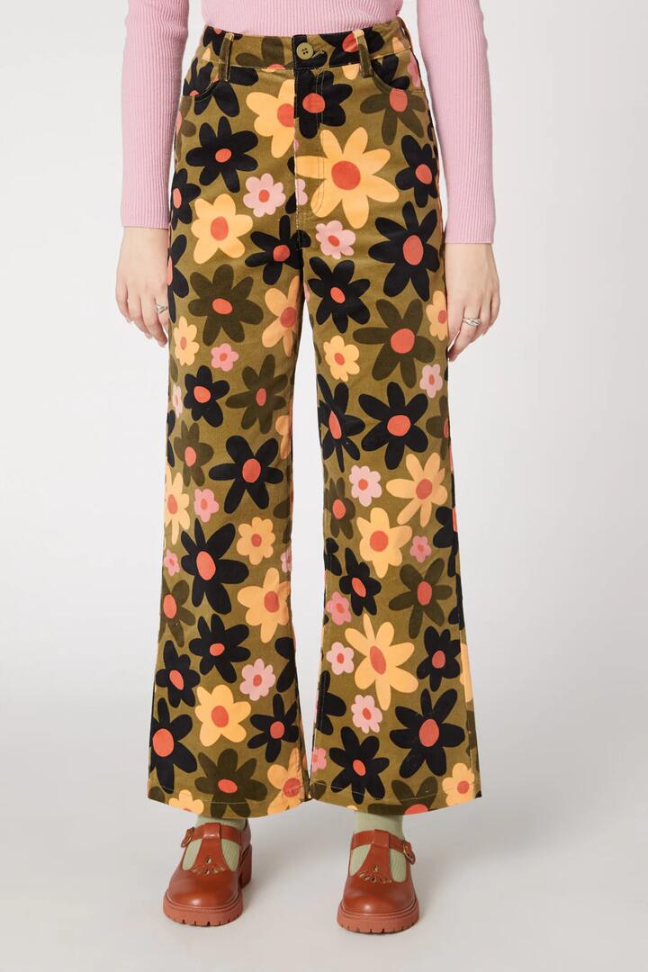 Image of a model wearing Pants. Productname: 60S Daisy Cord Pant in Olive colour by brand - Princess Highway