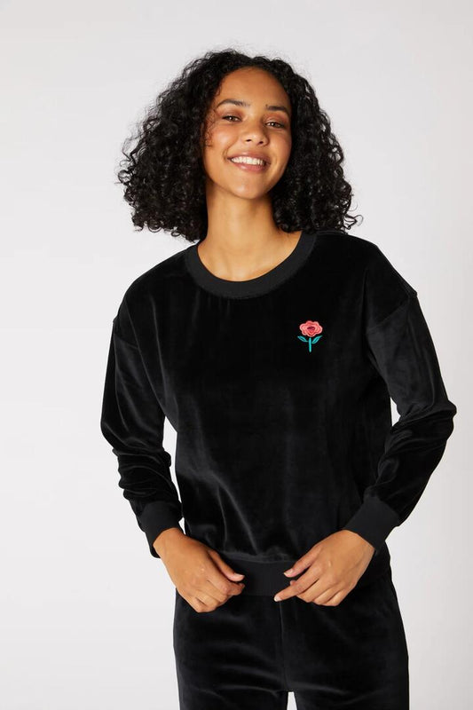 Image of a model wearing Outerwear. Productname: Harlow Velour Sweater in Black colour by brand - Princess Highway