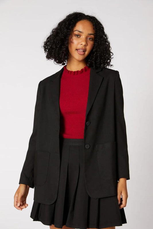 Image of a model wearing Outerwear. Productname: Briony Jacket in Black colour by brand - Princess Highway