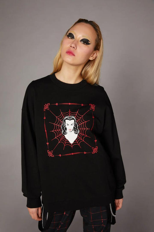 Image of a model wearing Outerwear. Productname: Vampire Print Sweater in Black colour by brand - Black Friday