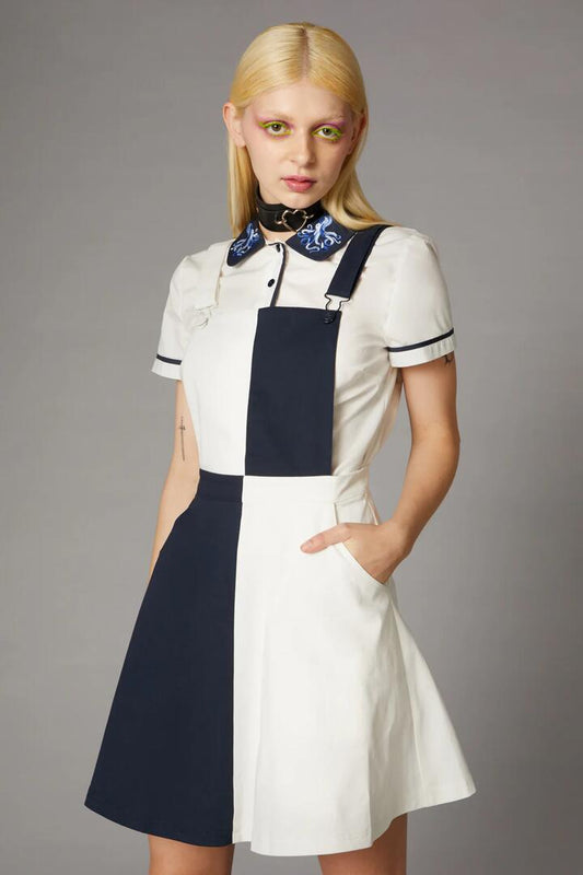 Image of a model wearing Dress. Productname: Checkerboard Detail Pinafore in Navy/White colour by brand - Black Friday