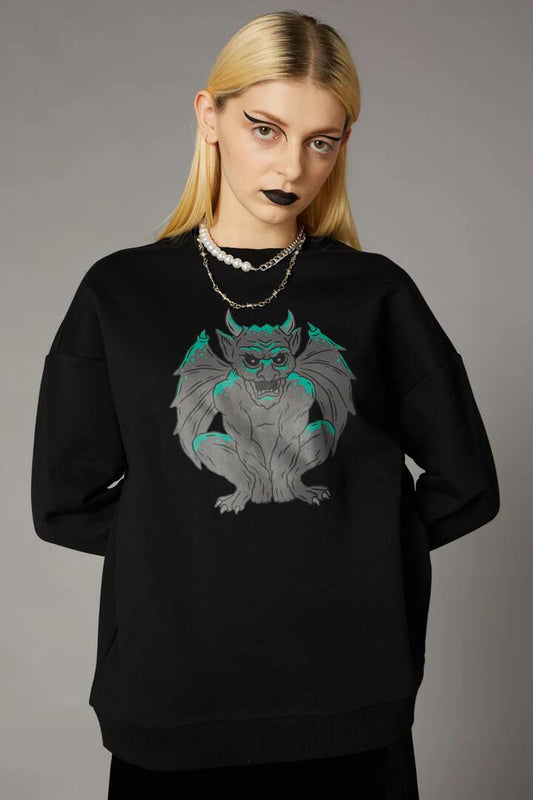 Image of a model wearing Outerwear. Productname: Gargoyle Print Sweater in Black colour by brand - Black Friday