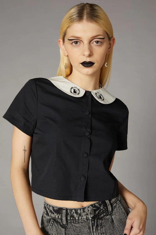 Image of a model wearing Tops. Productname: Cameo Embroidered Blouse in Black colour by brand - Black Friday
