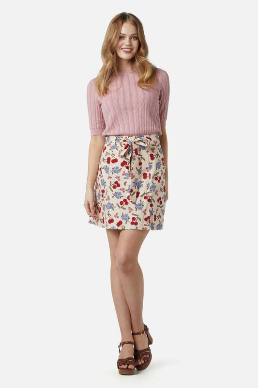 Image of a model wearing Skirts. Productname: French Cherry Flippy Skirt in Cream colour by brand - Princess Highway