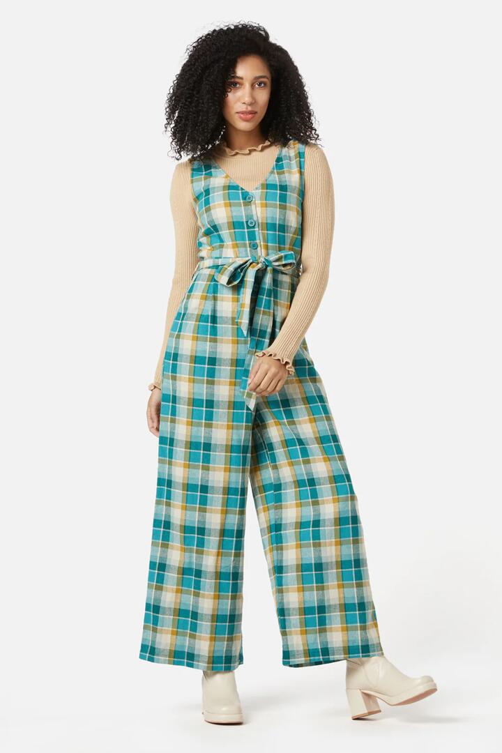 Image of a model wearing Outerwear. Productname: Laura Check Jumpsuit in Teal colour by brand - Princess Highway