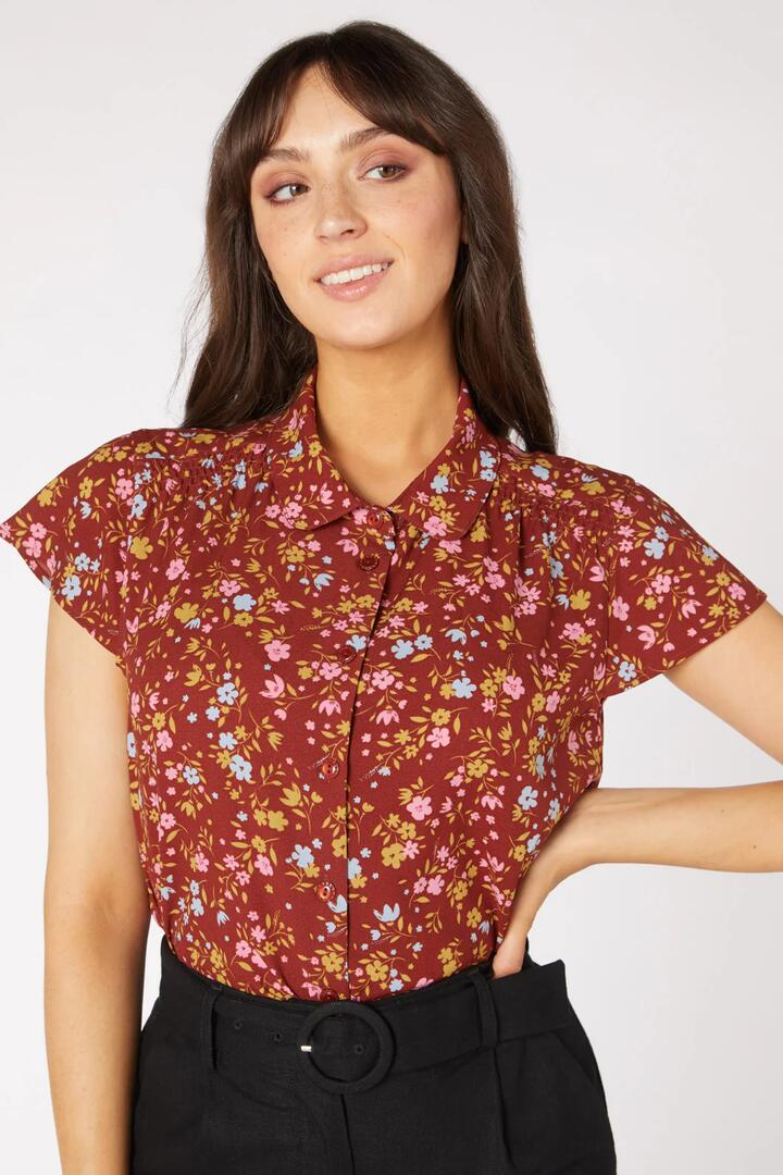 Image of a model wearing Tops. Productname: Erika Blouse in Black colour by brand - Princess Highway