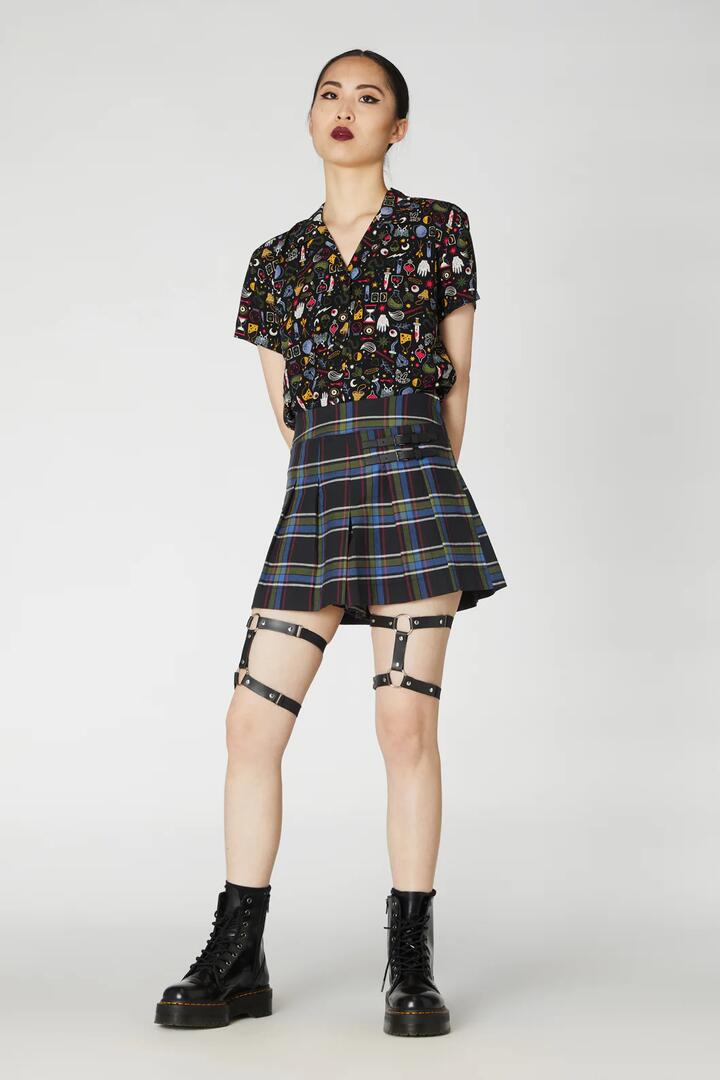 Image of a model wearing Skirts. Productname: Esmeralda Skort in Olive colour by brand - Black Friday