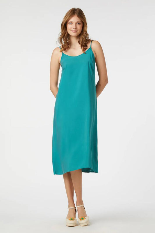 Image of a model wearing Dress. Productname: Tilda Slip Dress in Teal colour by brand - Princess Highway