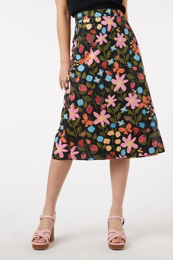 Image of a model wearing Skirts. Productname: Gorgeous Spring Skirt in Black colour by brand - Princess Highway