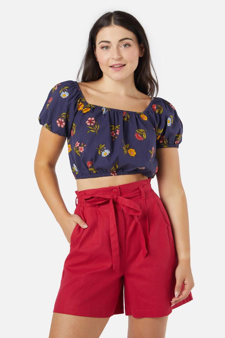 Image of a model wearing Tops. Productname: Mietta Top in Navy colour by brand - Princess Highway