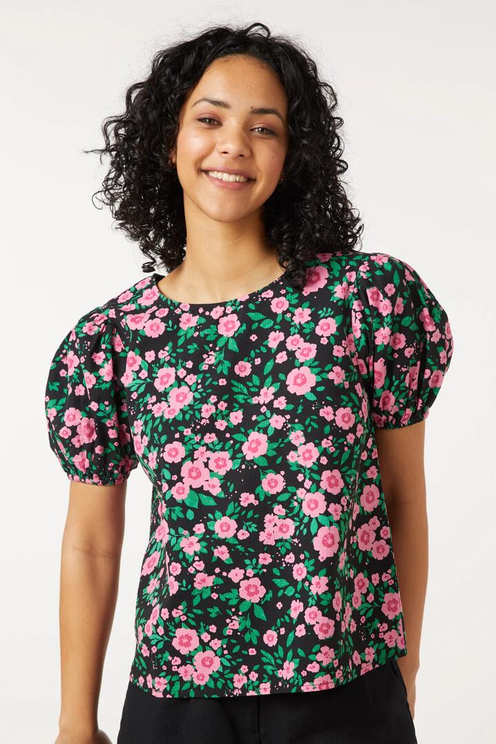 Image of a model wearing Tops. Productname: Estelle Top in Black colour by brand - Princess Highway