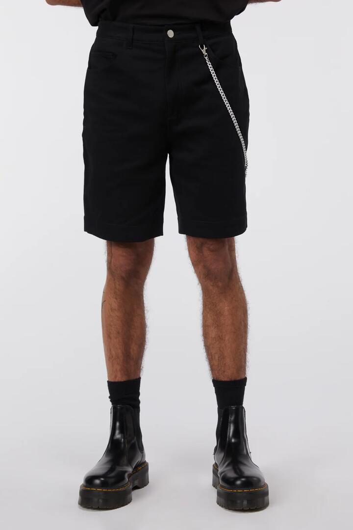 Image of a model wearing Shorts. Productname: Chain Trim Shorts in Black colour by brand - Dangerfield