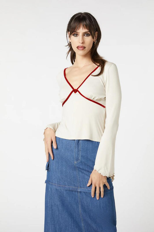 Image of a model wearing Tops. Productname: Billow Breeze Top in Cream colour by brand - Dangerfield