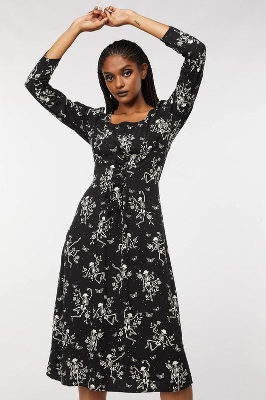 Image of a model wearing Dress. Productname: Garden Skelly Dress in Black colour by brand - Dangerfield