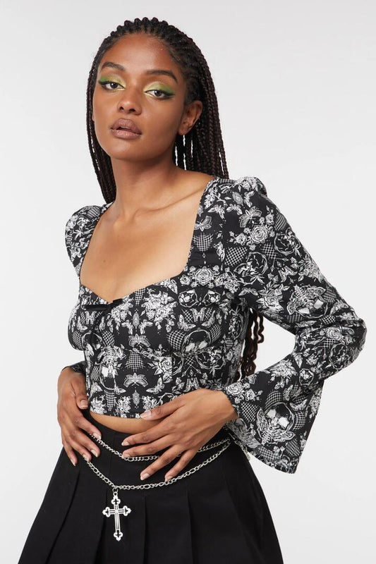 Image of a model wearing Tops. Productname: Romantic Skull Print Blouse in Black colour by brand - Dangerfield