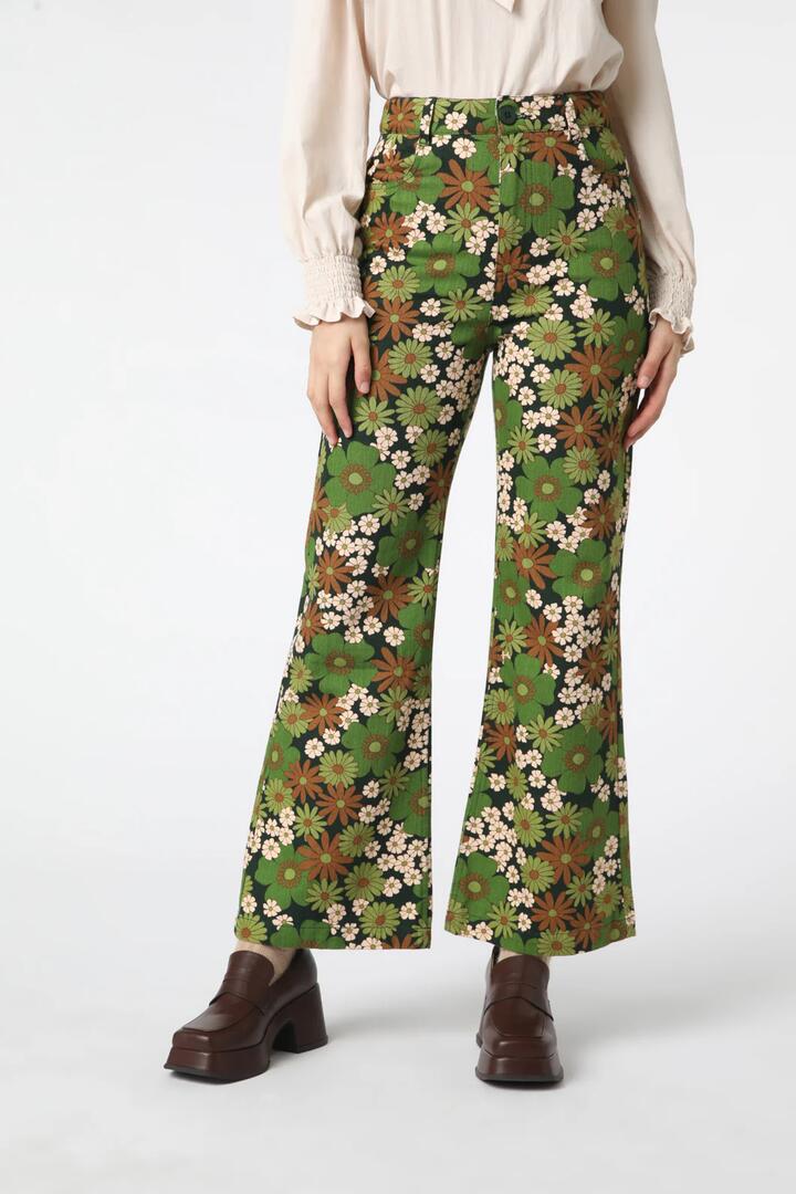 Image of a model wearing Denim. Productname: Bridgette Flare Jean in Green colour by brand - Princess Highway