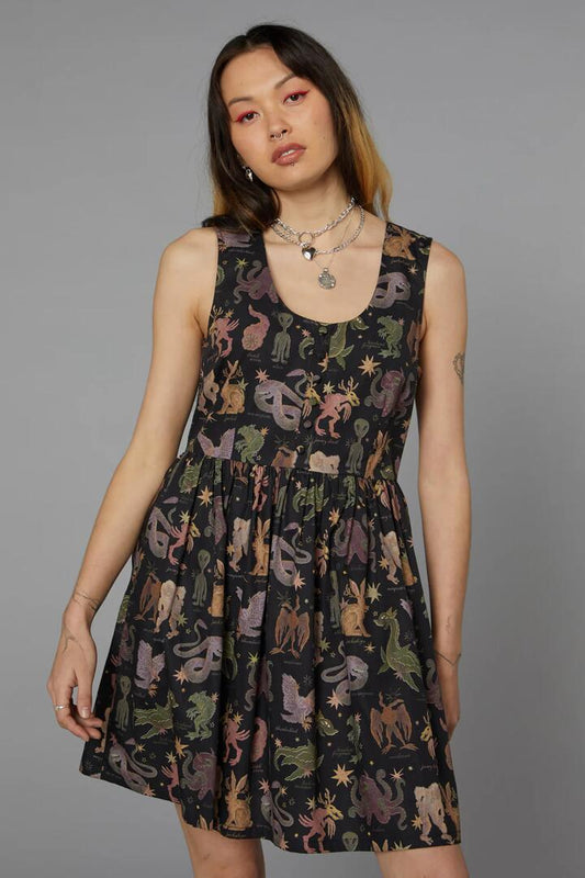 Image of a model wearing Dress. Productname: Cryptid Print Dress in Black colour by brand - Black Friday