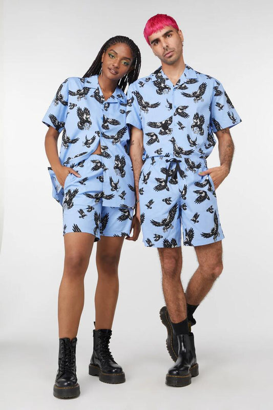 Image of a model wearing Shorts. Productname: Swoopin Magpie Trunks in Blue colour by brand - Dangerfield