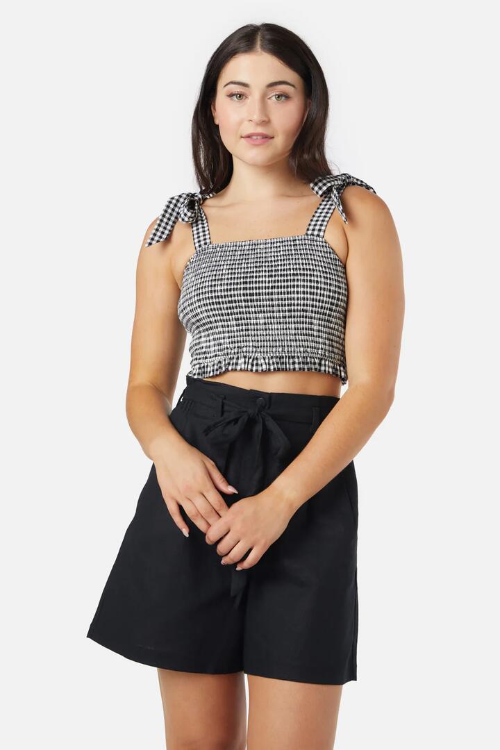 Image of a model wearing Tops. Productname: Tessa Check Shirred Top in Black colour by brand - Princess Highway
