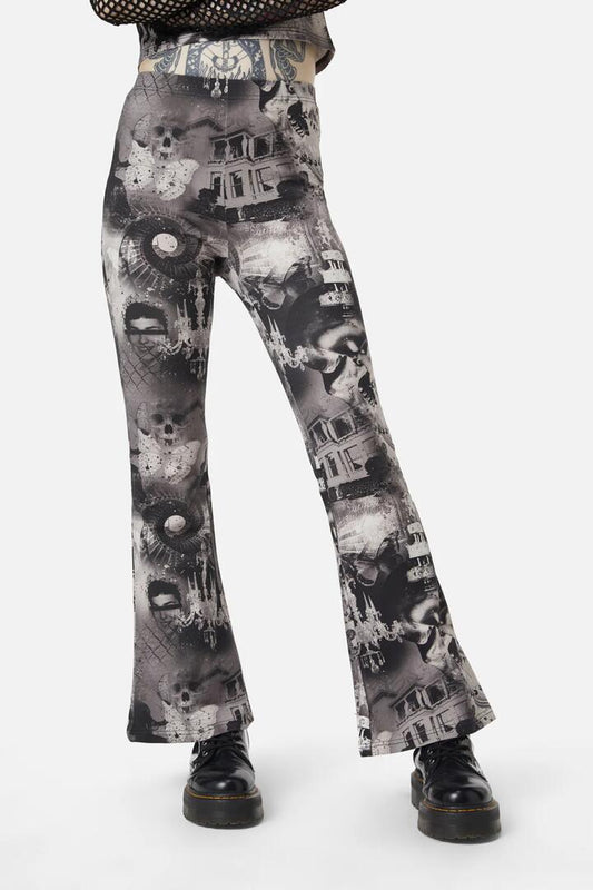 Image of a model wearing Pants. Productname: Blackfriars Flare Pant in Black colour by brand - Dangerfield