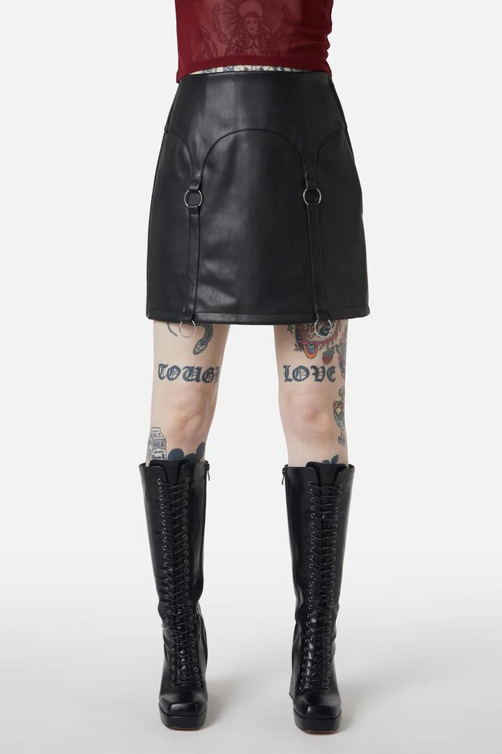 Image of a model wearing Skirts. Productname: Guarded Pu Skirt in Black colour by brand - Dangerfield