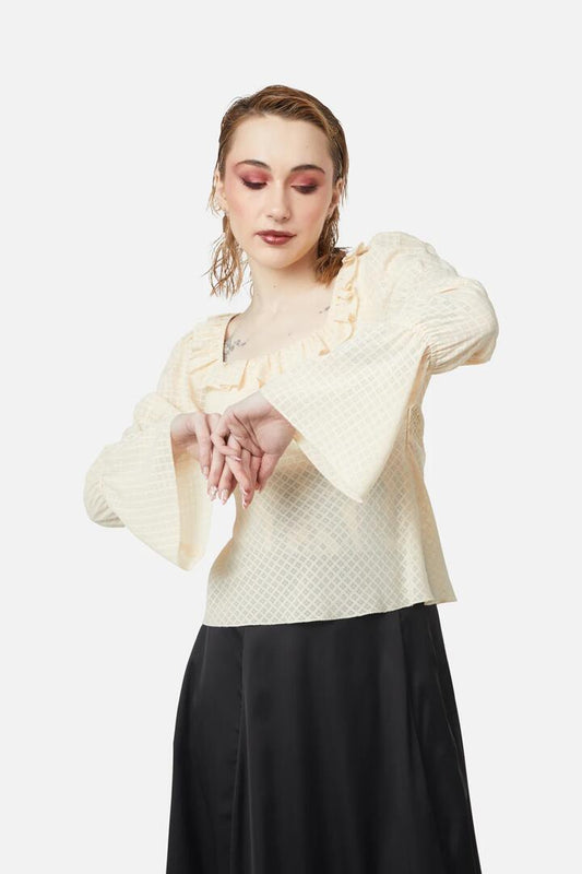 Image of a model wearing Tops. Productname: All Of White Sheer Blouse in Cream colour by brand - Dangerfield
