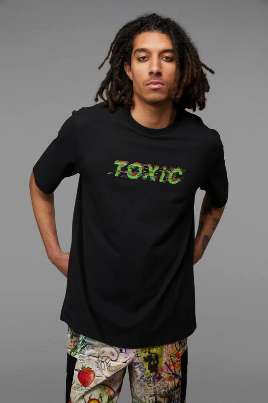 Image of a model wearing Tops. Productname: Toxic Tee in Black/Green colour by brand - Black Friday